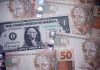 Dólar abre em alta, de olho nos preços do petróleo e cenário político brasileiro